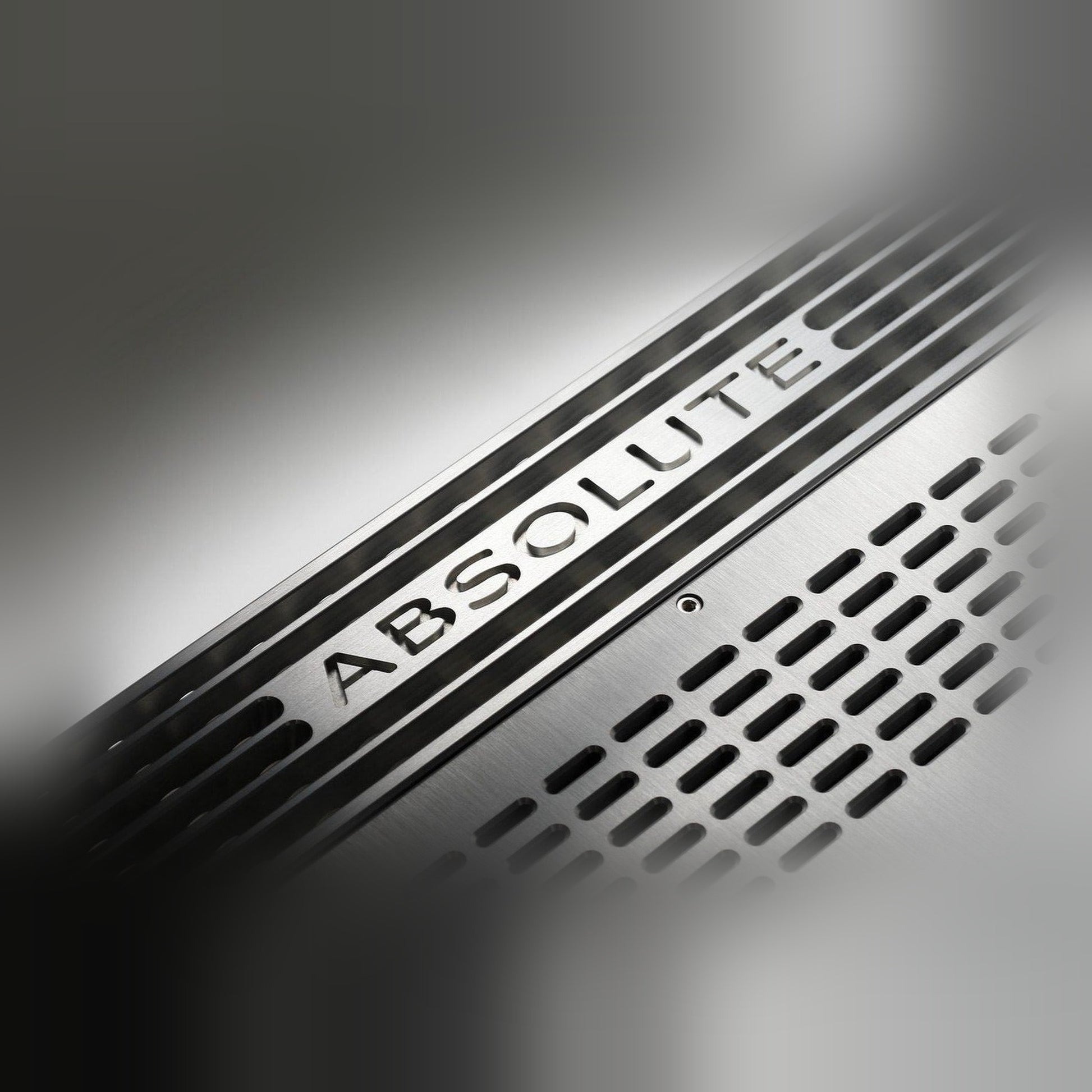 Audio Analogue ABsolute 3.0 Vollverstärker Silber, Detailansicht der Deckelgravur ABsolute mit Lüftungsschlitzen