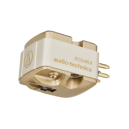 Audio-Technica AT33xMLB MC-Tonabnehmer Schrägansicht mit cremefarbenem Gehäuse und goldener Basis