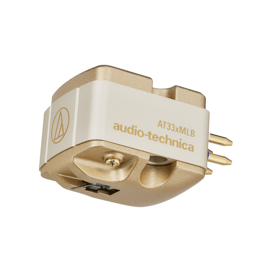 Audio-Technica AT33xMLB MC-Tonabnehmer Schrägansicht mit cremefarbenem Gehäuse und goldener Basis