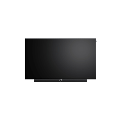 Loewe antares 55 OLED-Fernseher Frontansicht an Wandhalterung mit integrierter Soundbar