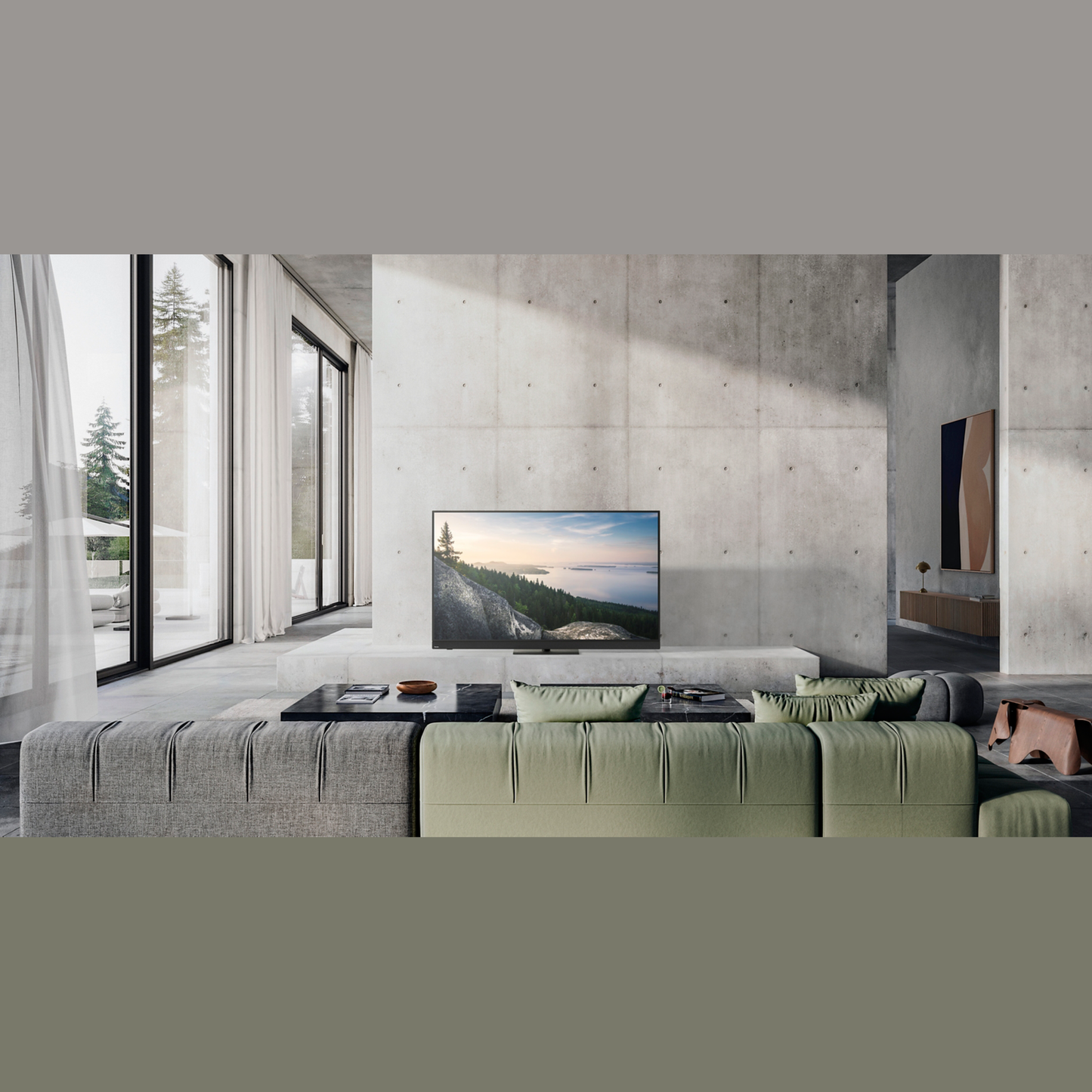 Panasonic TV-77Z90BEK OLED-Fernseher Lifestyle an Betonwand im Wohnraum
