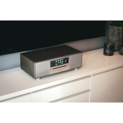 Sonoro Prestige All-in-One Lifestyle auf hellem Sideboard, Graphit matt