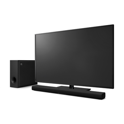 Yamaha True X Bar 50A Dolby-Atmos-Soundbar Schwarz Schrägansicht mit Fernseher und Subwoofer