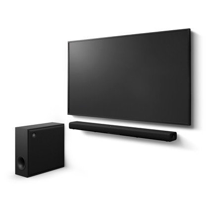 Yamaha True X Bar 50A Dolby-Atmos-Soundbar Schwarz Schrägansicht mit wandmontiertem Fernseher